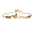 Bracelet doré avec lettrage 'Mama', breloques papillons et pierres colorées - Papillon Mama-Chaîne Serpent