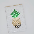 Dettaglio di paillettes reversibili con motivo a ananas su un quaderno per il fai da te - Ananas Dorato