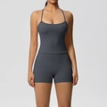 Detail of grey two-piece yoga set featuring thin strap tank top and high waist shorts - S / Top And Bottom / Chestnut Brown
