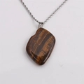 Collier avec pendentif irrégulier en œil de tigre et chaîne torsadée argentée style hip-hop - Style Oeil de Tigre
