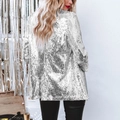 Detail of silver sequined blazer back showing high-density reflective finish and texture - White Silver