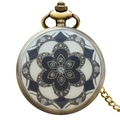 Vintage bronze quartz pocket watch featuring a symmetrical black and white floral enamel cover - Bronze - Black & White Geometric Floral