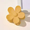 Detail of matte yellow flower hair claw clip with durable metal spring and frosted finish - Matte Flower Hair Clip - Light Yellow