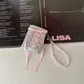Detail of silver balletcore wallet with pink satin ribbons and pearl charm strap - Balletcore Wallet + Pearl Hand Chain