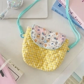 Detail of yellow quilted crossbody bag with cartoon puppy print and blue twisted strap - Latte Blue Dog