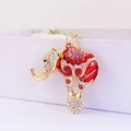 Llavero de elefante de circo brillante con esmalte rojo y acabado en oro - Rojo
