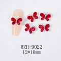 Detalle macro de dije de mariposa roja para uñas 12x10mm para diseño de manicura profesional - Gran rojo (Base de plata)