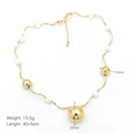 Macro detail of wave-shaped gold pearl necklace showing 15.5g weight and dimensions - Wave Pearl Chain