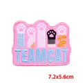 Close-up of Team Cat embroidered patch with five colorful cat paws and pink border - PE9179CT