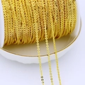 Close-up of 18K gold plated flat oval link chain spool for DIY jewelry making - 2mm Wide Flat O-Chain / Thick Silver