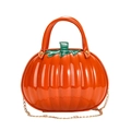 Orange pumpkin shaped handbag in glossy patent leather with gold chain strap - Orange