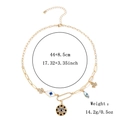 Goldene Münzkette mit mystischen Hand-, Augen- und blauen Kristallanhängern für Damen - Hamsa Hand Fatima Halskette / Gold (Blauer Stein)