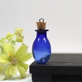 Mini dark blue translucent glass oval wish bottle with a cork stopper for DIY jewelry - Blue Oval Bottle With Eye Screw Cork
