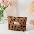 Brown leopard print plush makeup bag with Love Youth label and gold zipper details - Coffee