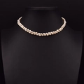 Elegant double-strand freshwater pearl necklace with vintage gold weave on a black display - Double Layer Woven Choker Style