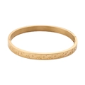 Brazalete de acero inoxidable dorado con patrón grabado de luna y estrellas - Dorado