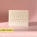 Beige faux leather jewelry display board with 17 gold hooks measuring 37x30cm - Single Row 17 Hooks / Rice White PU Leather
