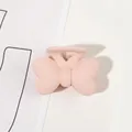 Macro shot of matte pink butterfly hair claw clip with a frosted finish on white background - 4cm Butterfly-Korean Pink