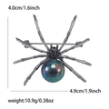 Spilla ragno in lega nera con perla iridescente e strass, dimensioni 4,0x4,9 cm - Colorato