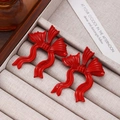 Elegant red enamel bow earrings for women with rhinestones in a jewelry box - Red