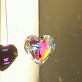 Faceted heart crystal suncatcher pendant with red hanging cord and colorful reflections - 30MM / Multicolor