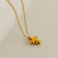 Polished gold stainless steel necklace featuring a bubbly minimalist letter T pendant - Letter T