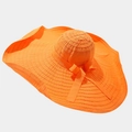 Close-up of orange sun hat featuring wide wavy brim and decorative bow detail - One Size / Bow Orange
