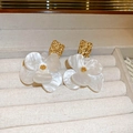 Macro shot of white flower earrings with pearl luster and golden textured studs in a jewelry box - 8# Silver Needle-White (Flower)