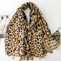 Chic leopard print cotton linen scarf with bright orange tassels on white background - Beige Black Brown & Orange Leopard (SL2409-023)
