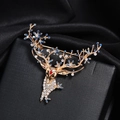 Golden reindeer brooch with blue floral petals and clear crystals on black silk base - WBR132 Royal Blue KC Gold Deer
