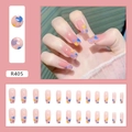Detalle de 24 uñas postizas rosas traslúcidas con diseños de corazones de colores R405 - Corazón de Lunares (R405)