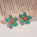 Retro gold flower earrings with blue petals and purple crystals on a vintage book background - Silver Earring Post-Blue