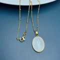 Oval gold Virgin Mary pendant necklace with white mother of pearl inlay on bead chain - Gold