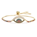 Verstellbares Evil-Eye-Armband in Gold mit bunten Zirkonia und Wimpern-Details - Baguette-Zirkonia Wimperndesign-Stil (CB0223CX)