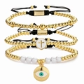 Set di tre bracciali regolabili con perline con croce dorata e ciondoli Evil Eye - Set da 3 Pezzi