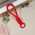 Braided red paracord phone lanyard with sturdy red metal ring for keychains - Red