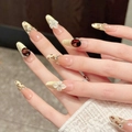 Champagne gold and amber press-on nails with 3D floral and leopard print details - XS / Long Oval Style