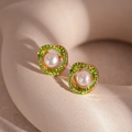 Detail of rose gold pearl earrings with interlaced rings and green rhinestone pavé - Green Wrap Zirconia Pearl Stud / Green