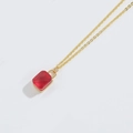 Elegant gold necklace featuring a rectangular red gemstone pendant on a fine link chain - Red