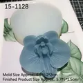Translucent orchid silicone mold with blue resin floral sample for DIY crafts - Clear