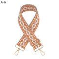 Detail of adjustable geometric diamond pattern bag strap with gold metal swivel hooks - Gold Buckle / Orange