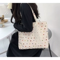 Close-up of a large canvas tote bag featuring colorful polka dots and white lace ribbon - Beige Colored Polka Dots (With Lace Ribbon)