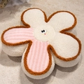 Plush flower cushion in white and pink sherpa fabric with a smiling cartoon face - Pink Stripe and White
