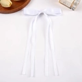 Elegant white satin ribbon bow hair clip with long streamers shown on a clean background - White