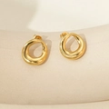 Elegant gold-plated titanium steel hoop earrings with an organic lava style design - Gold / 14k