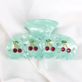 Mint green acrylic hair claw clip with red rhinestone cherry details on white silk - Green