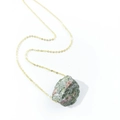 Detailed close-up of a gold chain necklace featuring a natural unakite gemstone pendant - Unakite