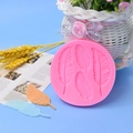 Stampo rotondo in silicone rosa per piume in pasta di zucchero con quattro motivi - Rosa Piccolo (2)
