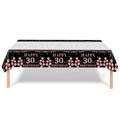 Detail of black and rose gold 30th birthday tablecloth with festive star balloon patterns - Thirtieth Birthday - Tablecloth