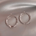 Macro detail of silver circle earrings with metallic discs and sparkling zircon beads - A1419 Silver Hammered Texture Hoop Earrings